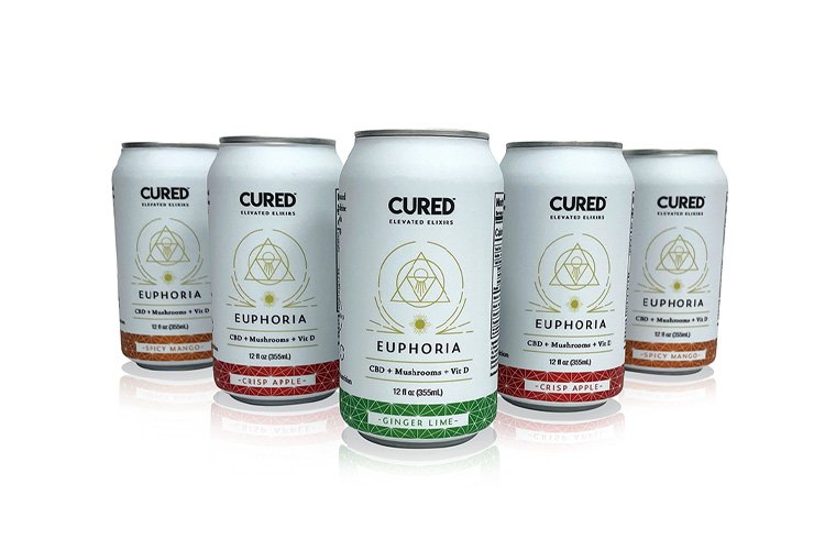 Five cans of CURED Elevate Elixirs Euphoria CBD beverages with different flavors, arranged in a row on a reflective surface.