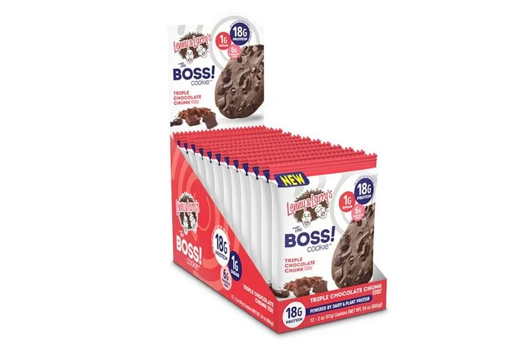 Individual packages of Lenny & Larry's The Boss! Cookie, triple chocolate chunk flavor, arranged in a red display box.