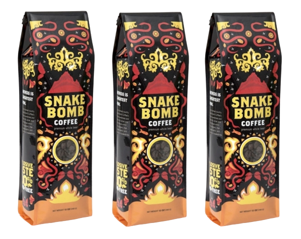 Three packages of Snake Bomb coffee, black with red and yellow decorative elements and a circular window showing the ground coffee inside.
