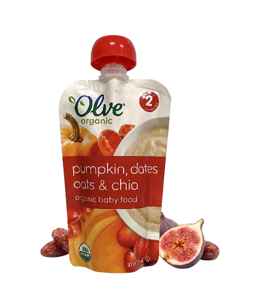 A pouch of Olve organic baby food with pumpkin, dates, oats, and chia, standing upright with a red screw cap, with a fig and some dates in front of it.