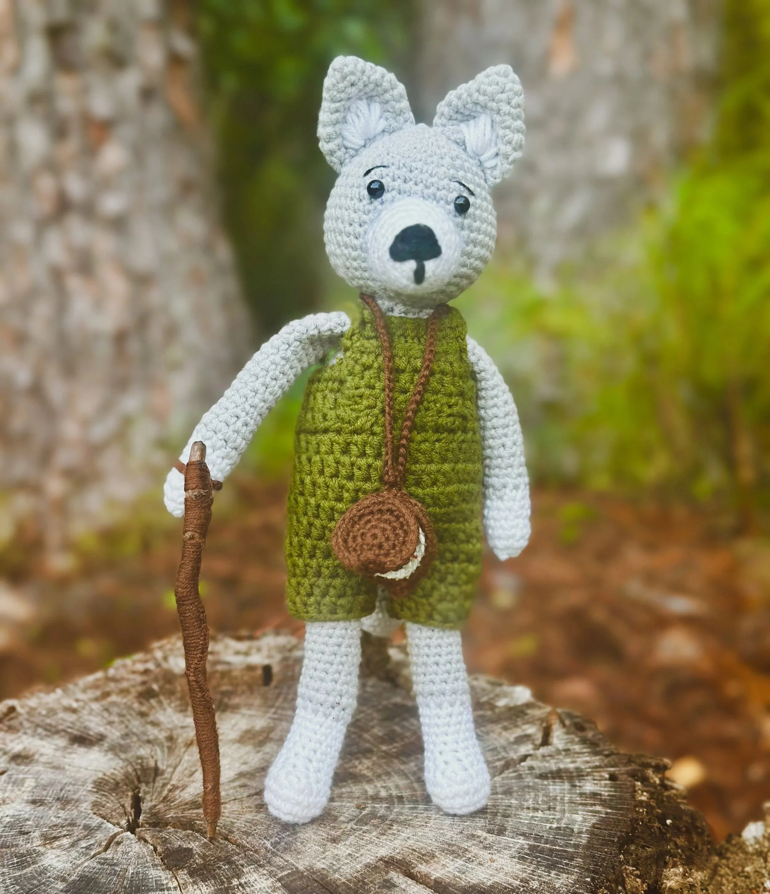 Wade the wolf, created by Stitches by Moonlight, wearing his signature dark green overalls. Guardian of Moonlit Hollow