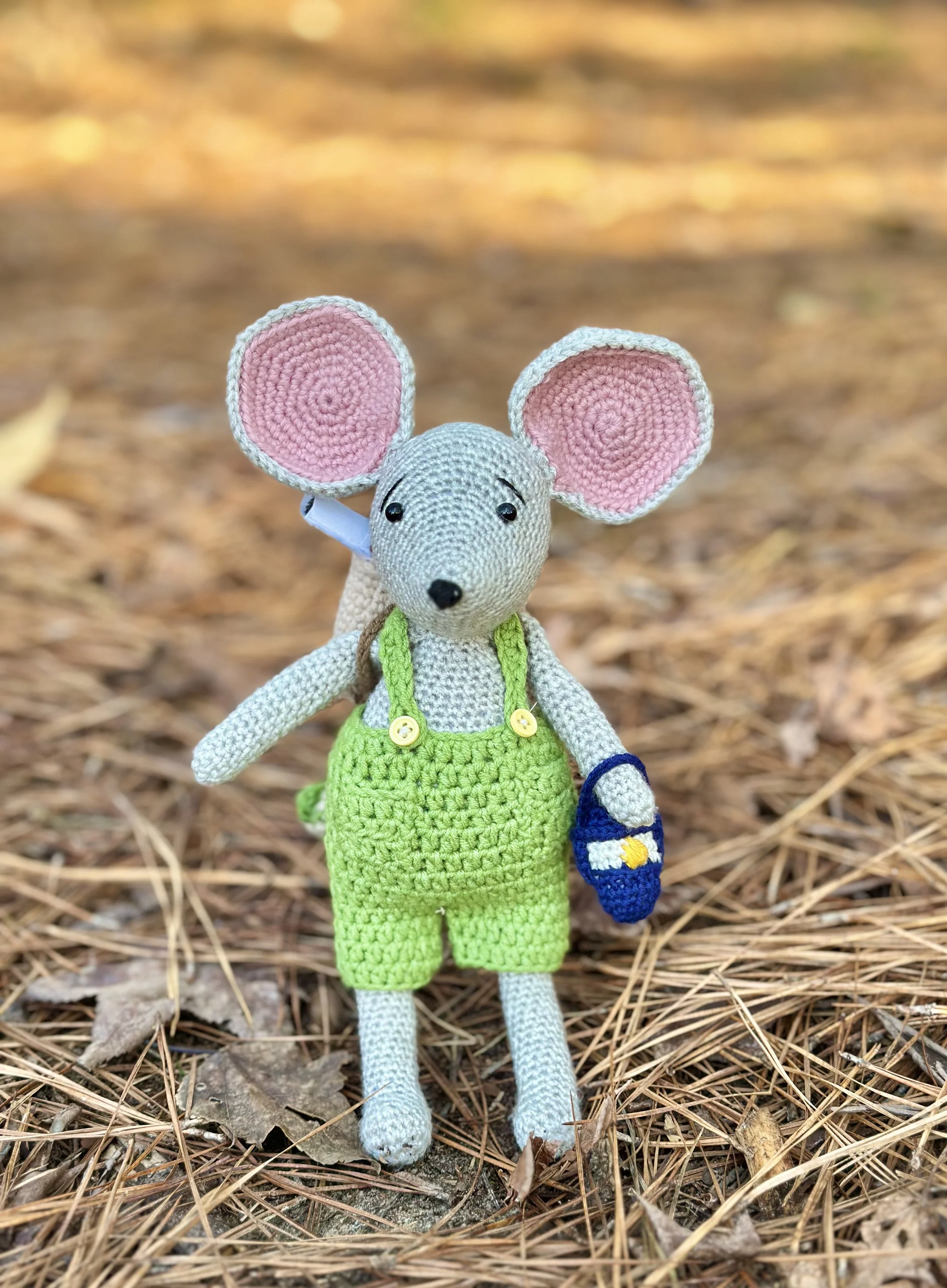 Max the mouse, created by Stitches by moonlight, and shown in his signature green overalls. Max is the map maker of Moonlit Hollow