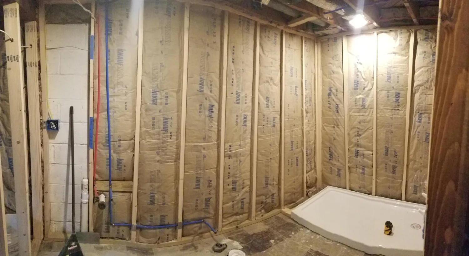 Basement bathroom framed and insulated with shower base set in Rockaway NJ
