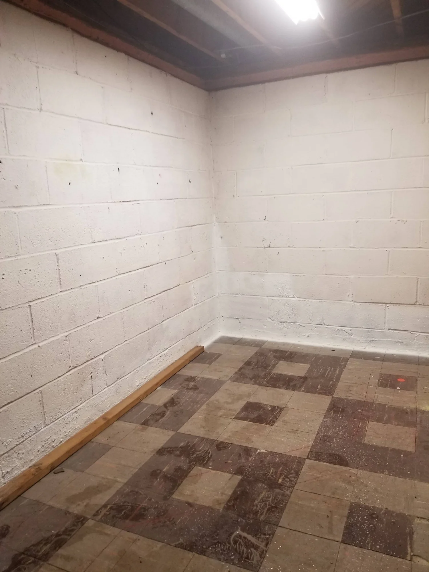 Unfinished basement space in Rockaway NJ before a new bathroom was built