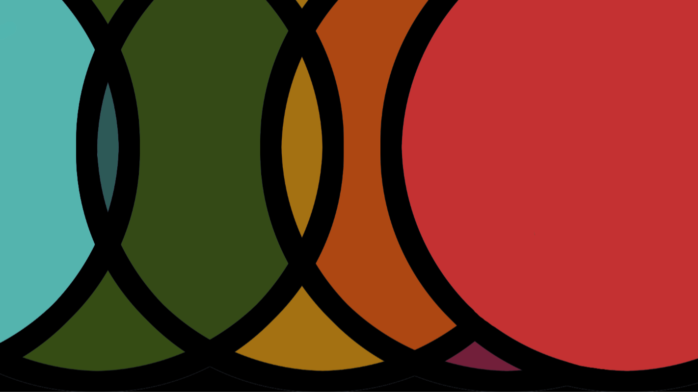 Close-up of colorful overlapping circles with black borders in various shades of green, orange, and red.
