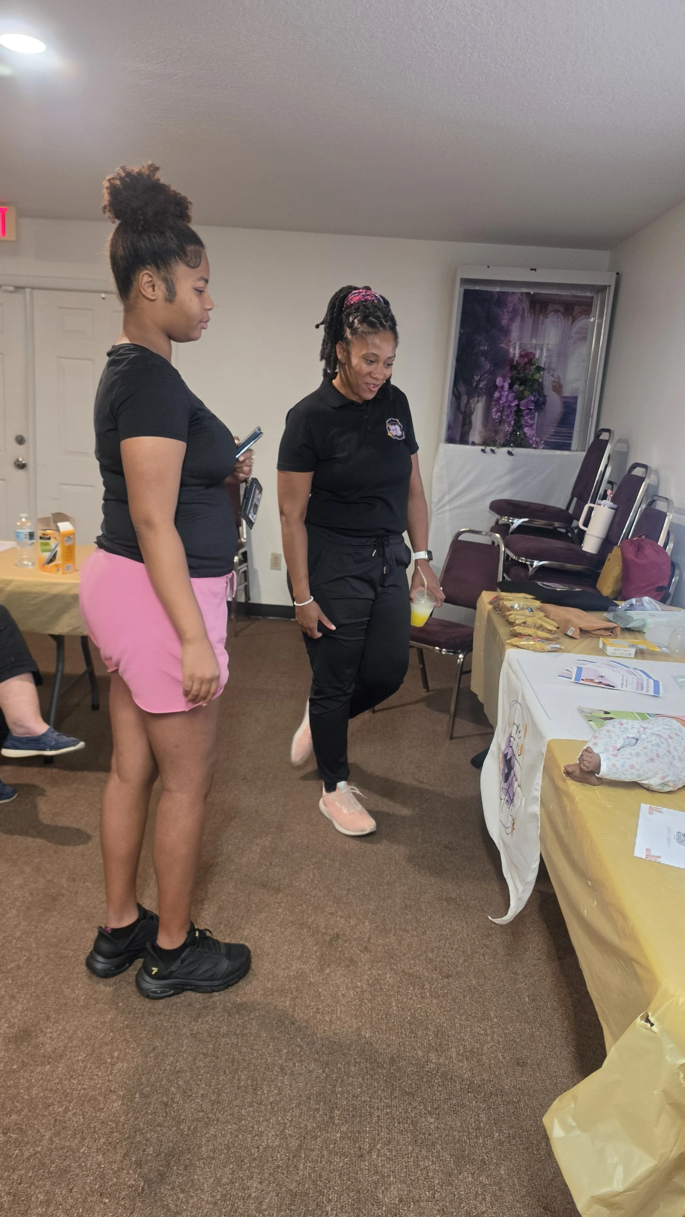 Attendee visiting a lactation vendor