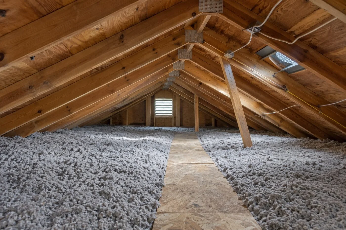 Illustrative cellulose insulation across a residential attic floor