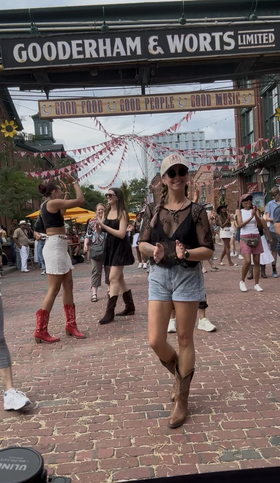 Cait dancing at the Toronto Country Fest line dance event.