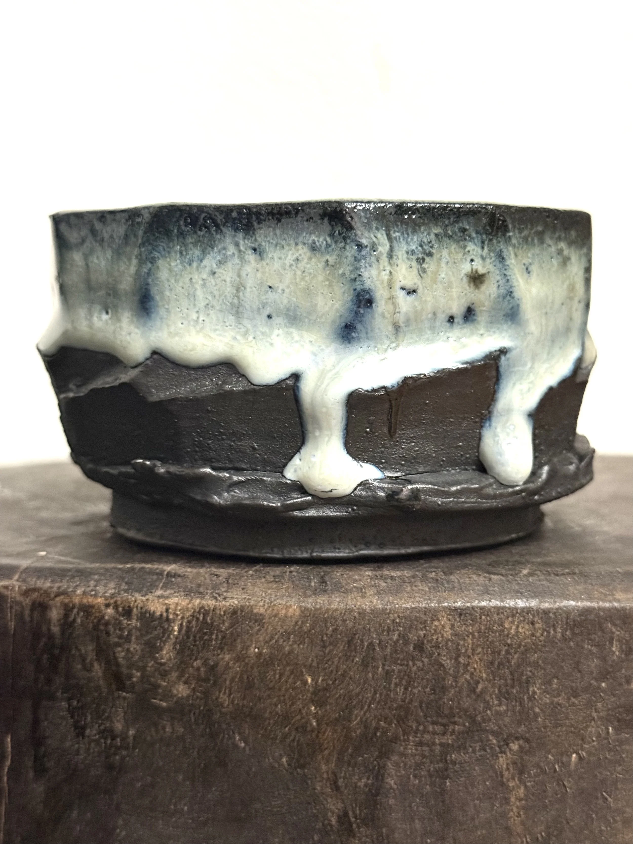 faceted bowl with cascading glaze drips 005