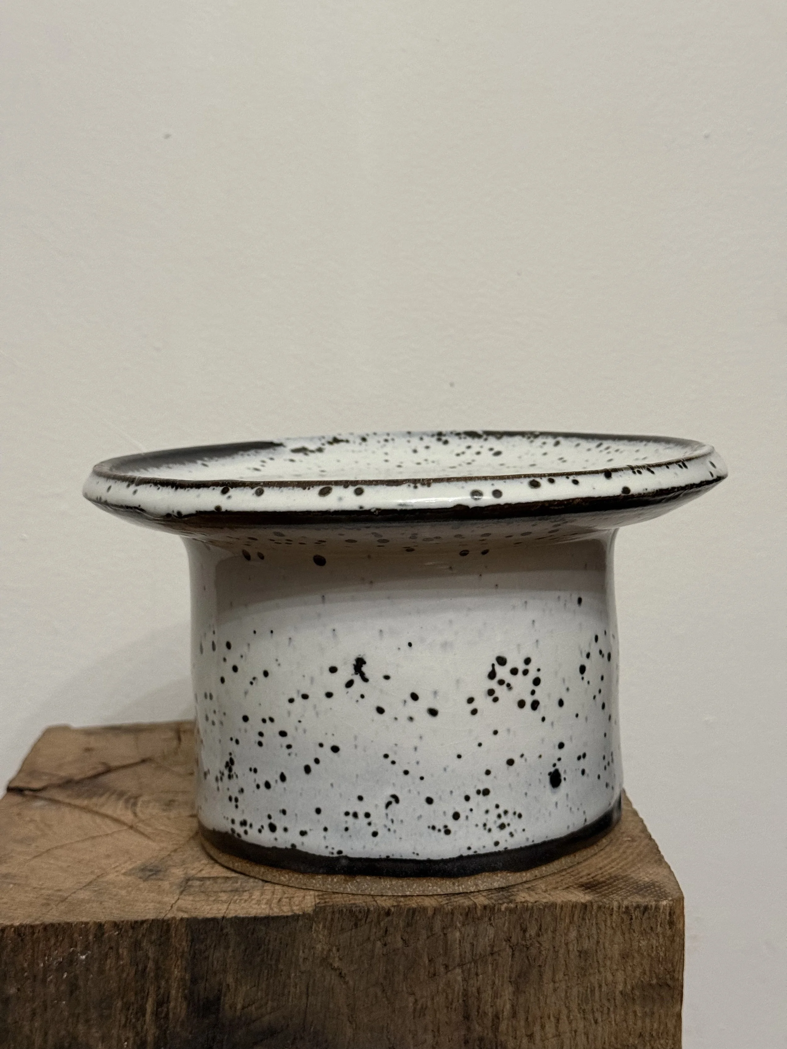 white speckled pedestal  vessel