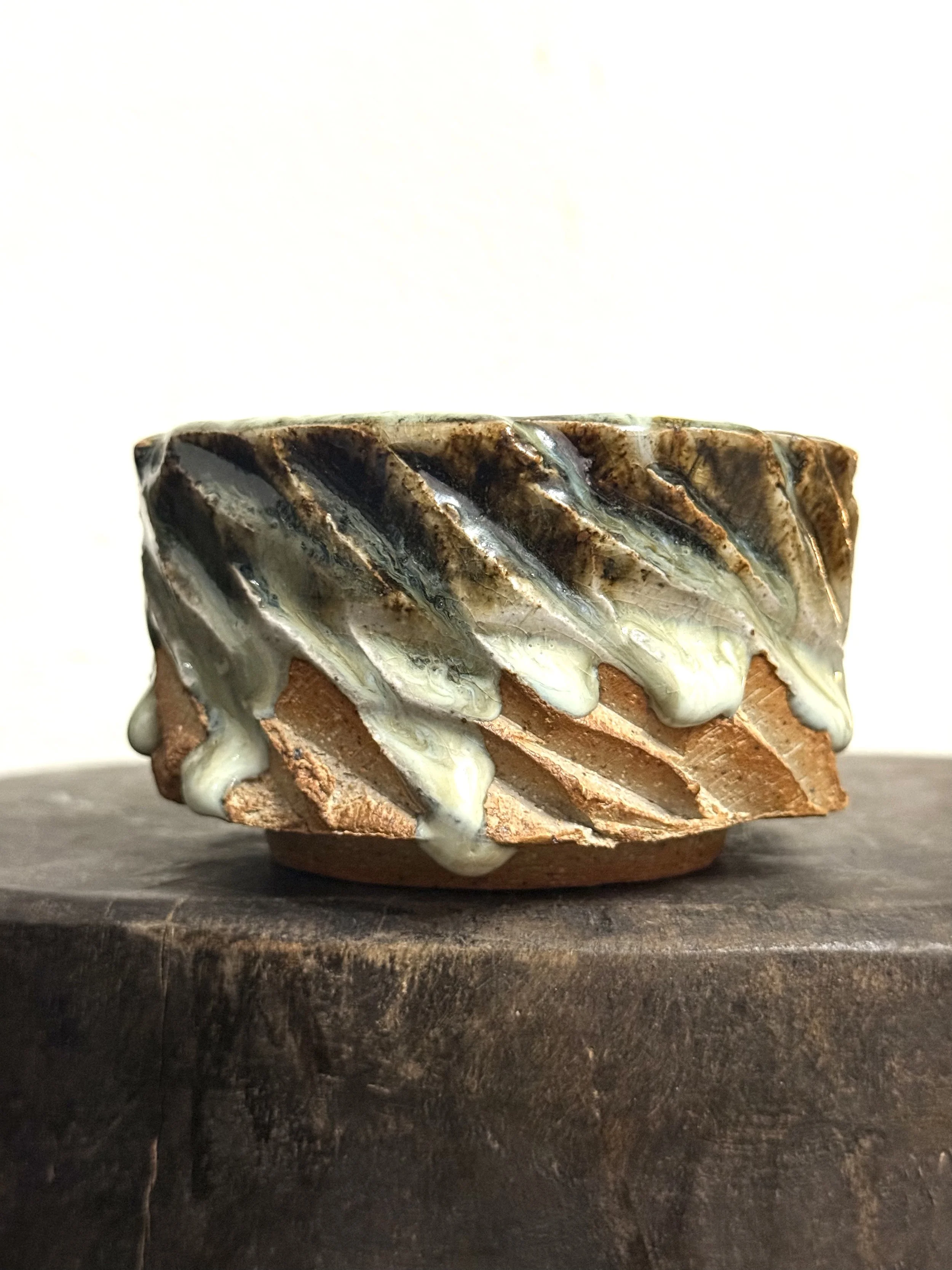 faceted bowl with cascading glaze drips 013