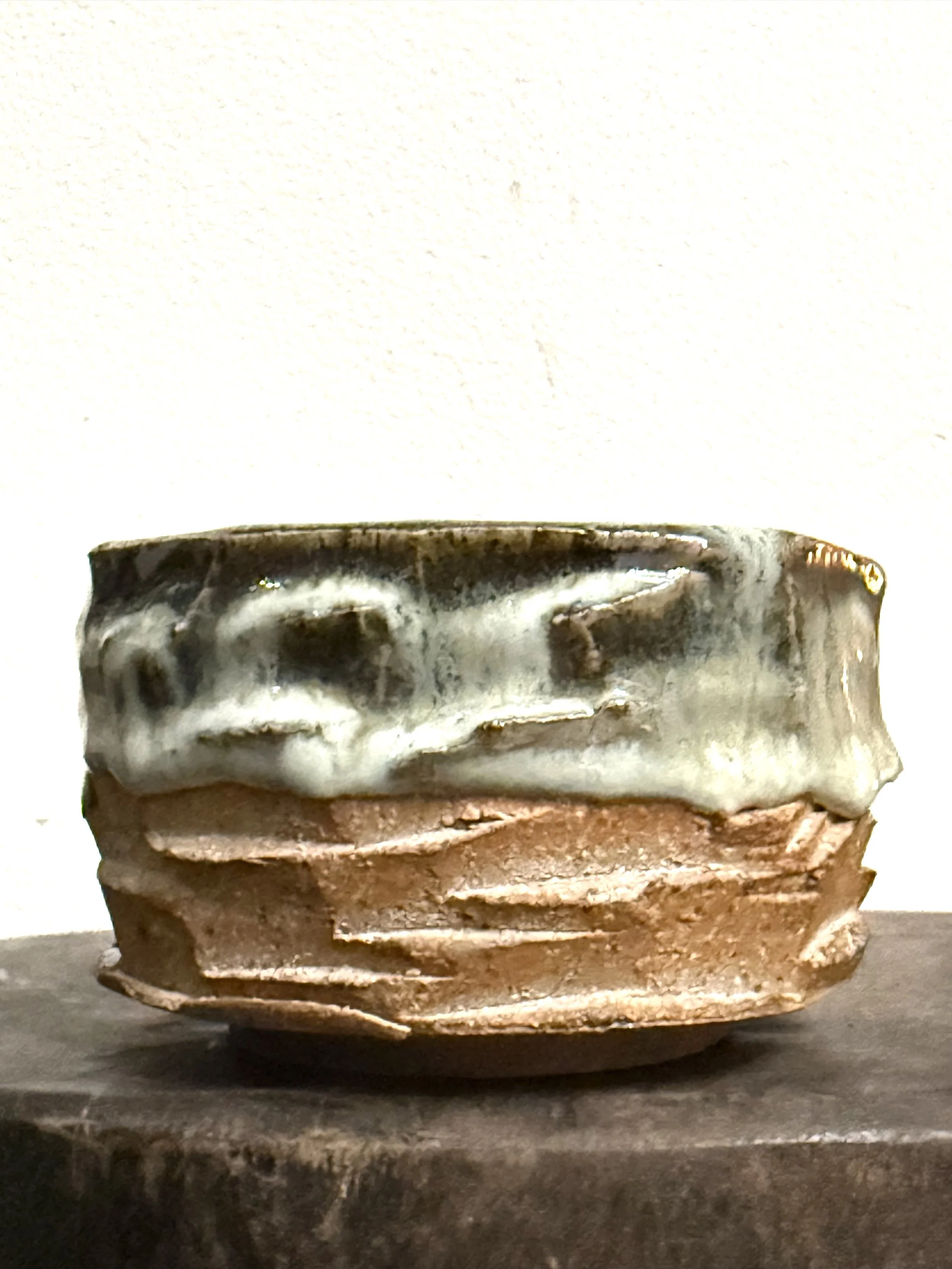 faceted bowl with cascading glaze drips 014