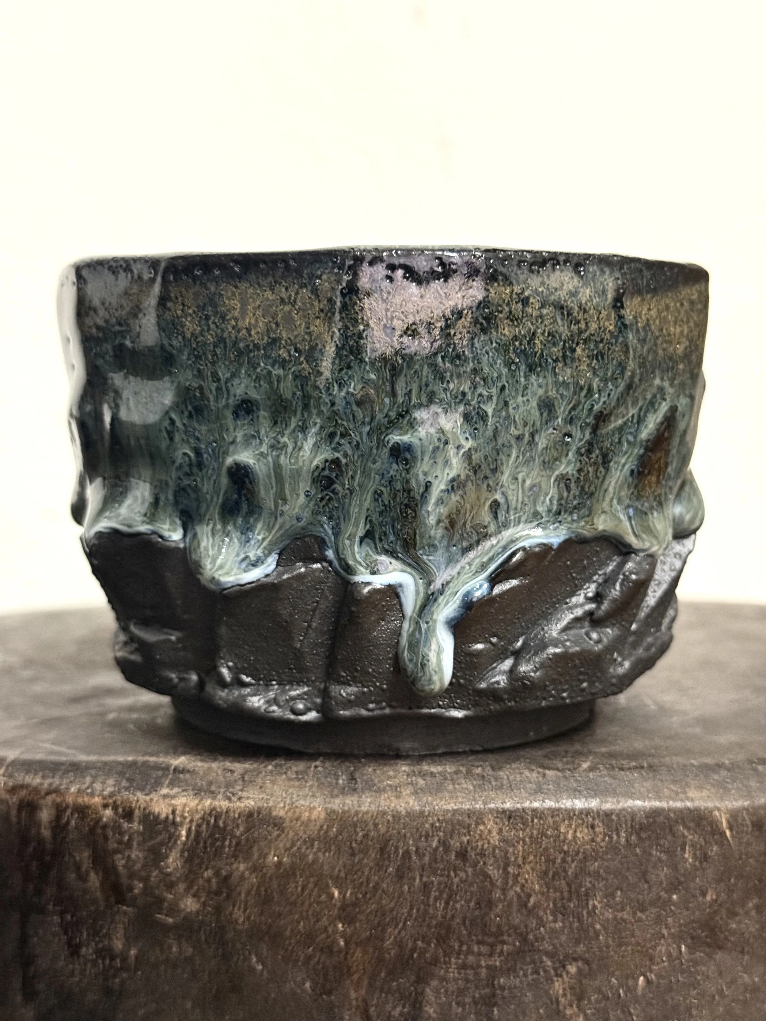 faceted bowl with cascading glaze drips 008