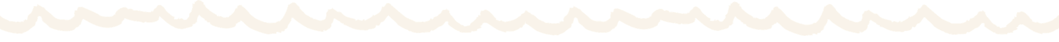 Close-up of a decorative scalloped edge with dark lines on a white surface.