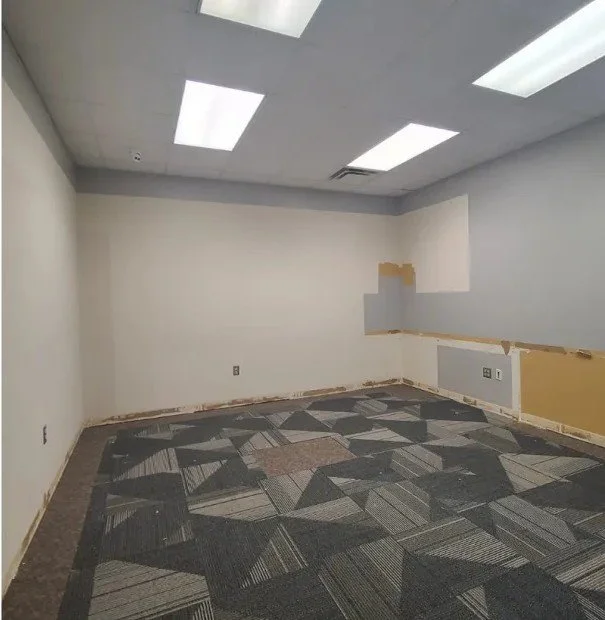 Fully cleared office room after a commercial cleanout in Memphis, TN — bare walls, empty floor, ready for the next step.