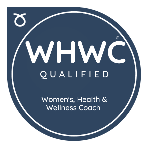 A circular logo with a dark blue background and white text. It reads "WHWC Qualified" at the top and "Women's, Health & Wellness Coach" at the bottom, with a small symbol resembling the Venus symbol in the top left corner.