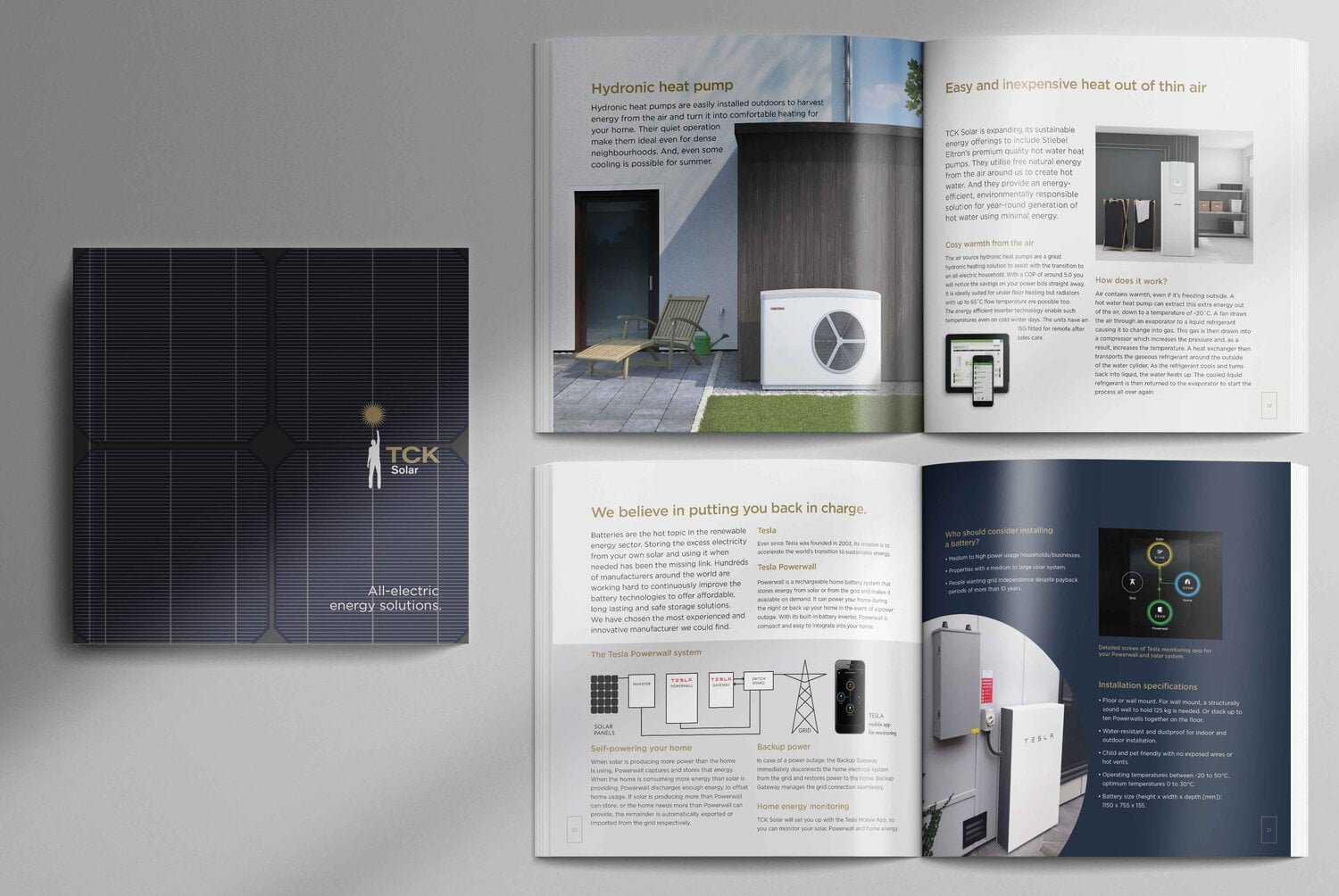 Open magazine displaying solar power and home energy solutions, with a solar panel on the left page and indoor energy system pages on the right.