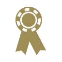 Gold award ribbon with a circular emblem at the top and two ribbons hanging below.