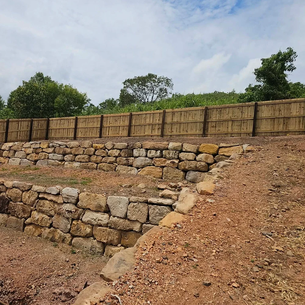 Stone retaining walls and fencing