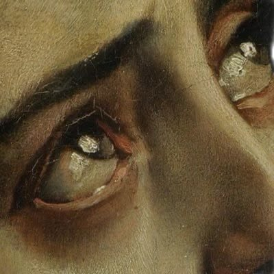 Close-up of a person's eyes showing tears.
