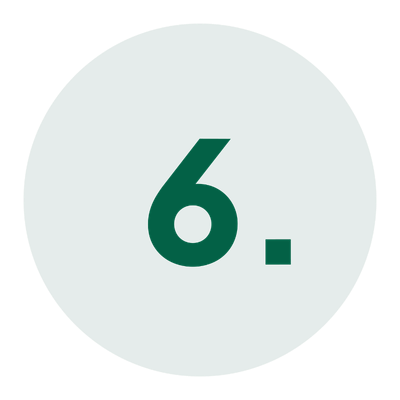 Green circle with the number 6 and a period inside it.