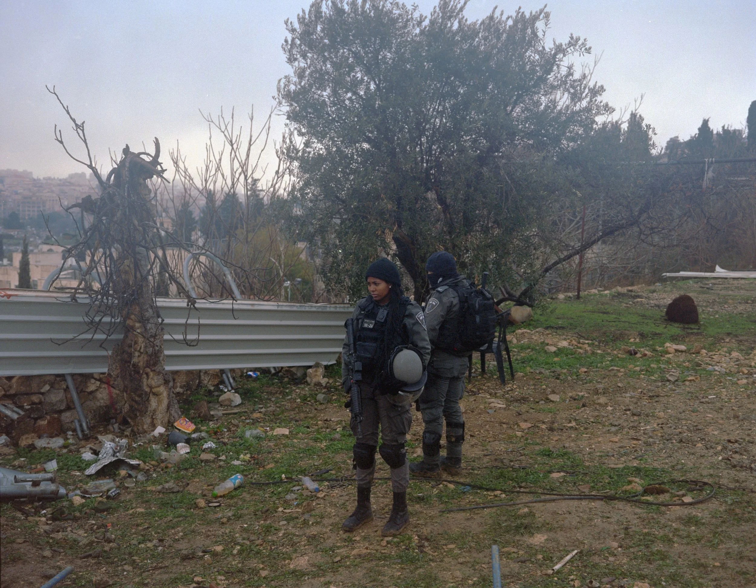Israeli Border Police officers monitor the demolition of the home of the Salhiyeh family, who were evicted from their plot of land in the predominantly Palestinian neighborhood of Sheikh Jarrah in East Jerusalem.