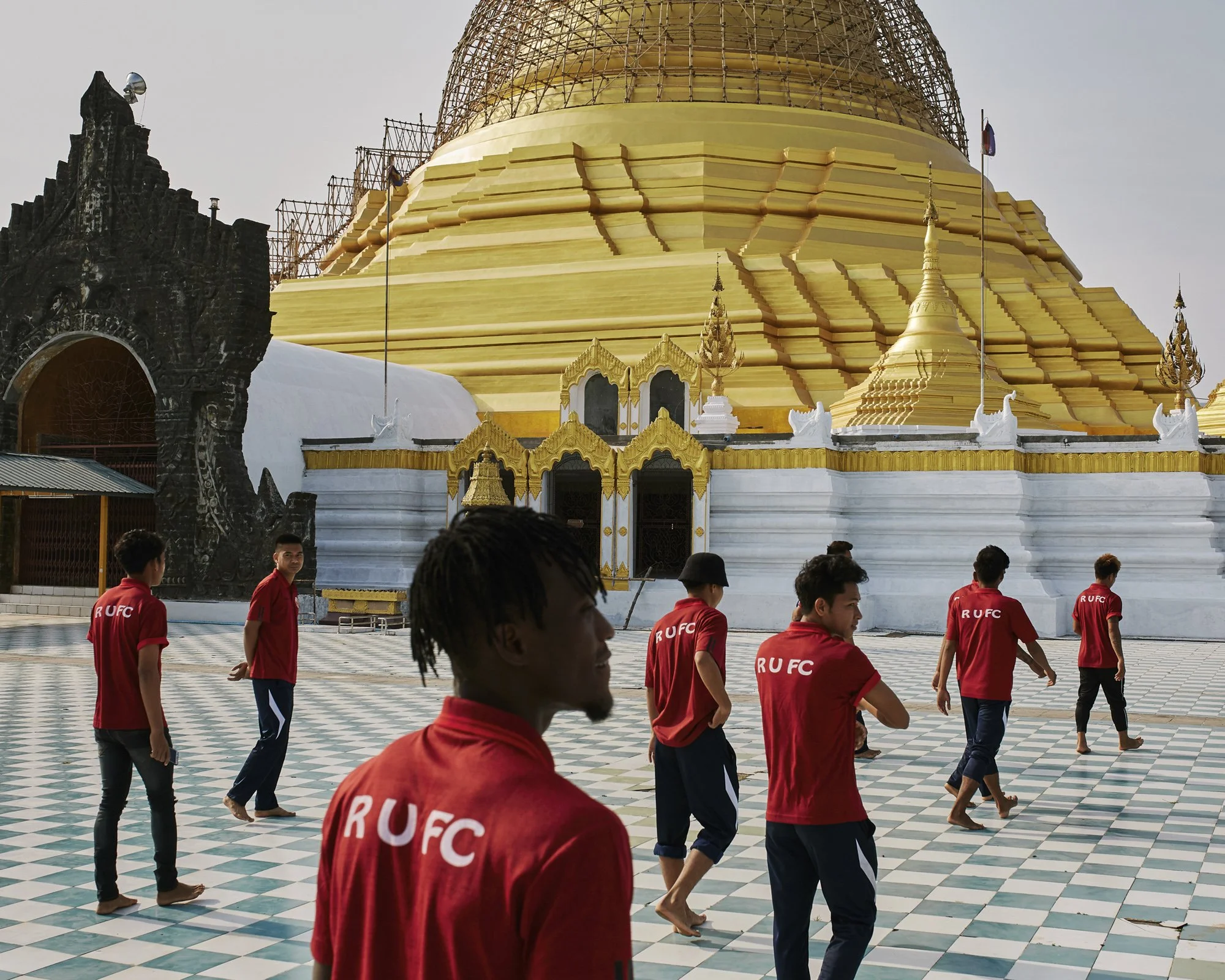 The RUFC players visit the Lawkananda pagoda of Sittwe, Rakhine State, Myanmar. April 7th 2019. © Lucien Lung / Riva