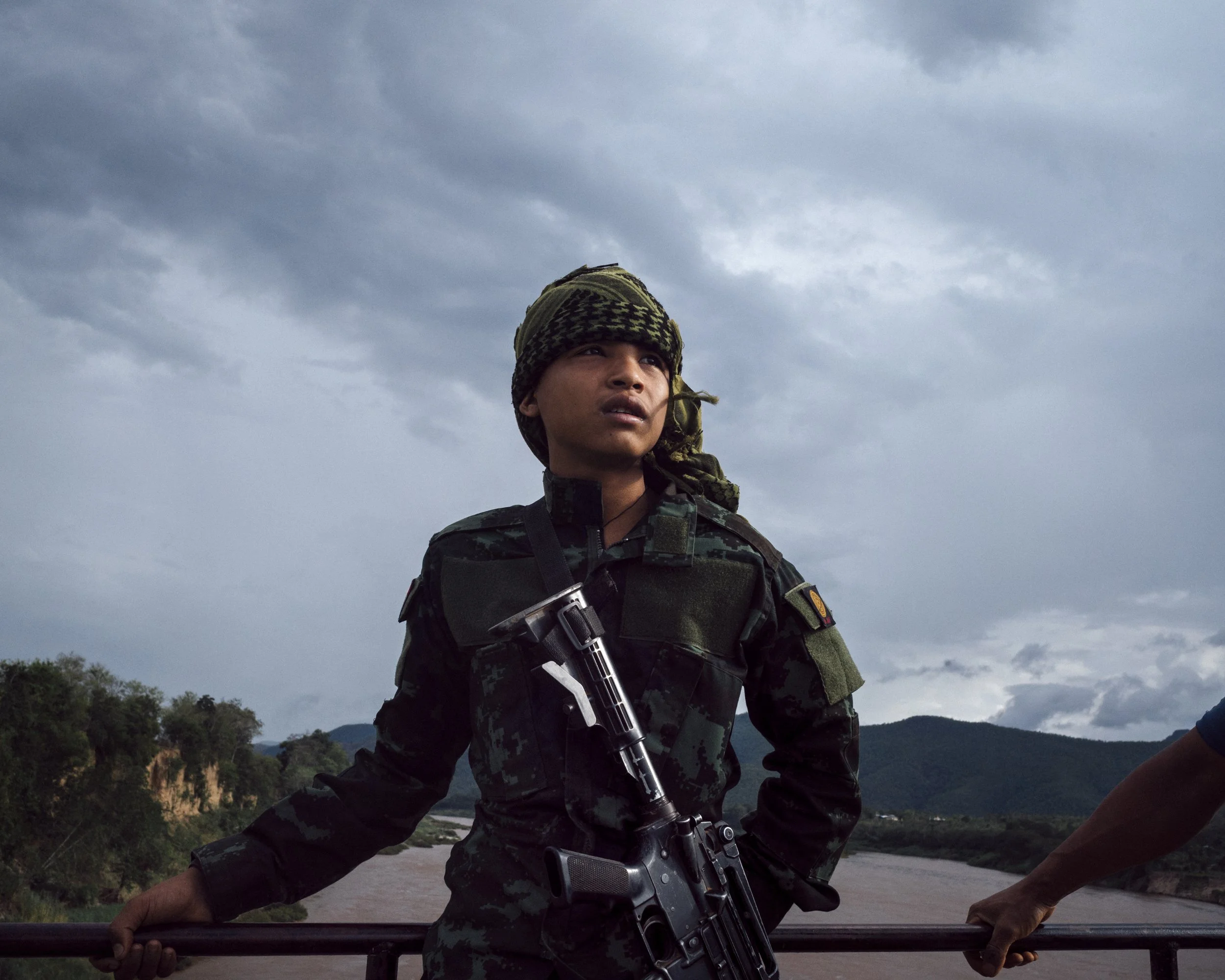 A young soldier of the Karenni Nationalities Defense Force (KNDF) on the road between Demoso and Mese, Karenni State, Myanmar.
