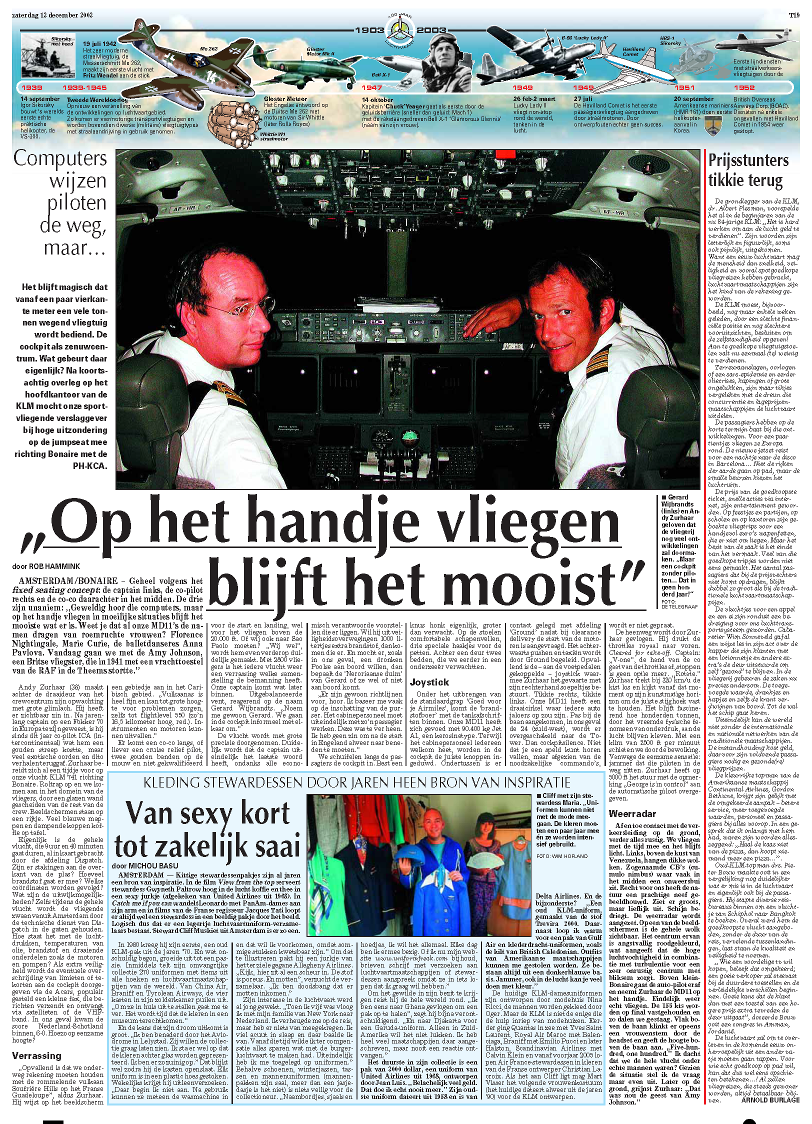 The image shows the cockpit of an airplane with two pilots, one on the left and one on the right, sitting in their seats. Above the pilots, there is a detailed timeline from 1903 to 2003 depicting significant events and milestones in aviation history. The article discusses the pilots and their experiences, with a headline mentioning flying.