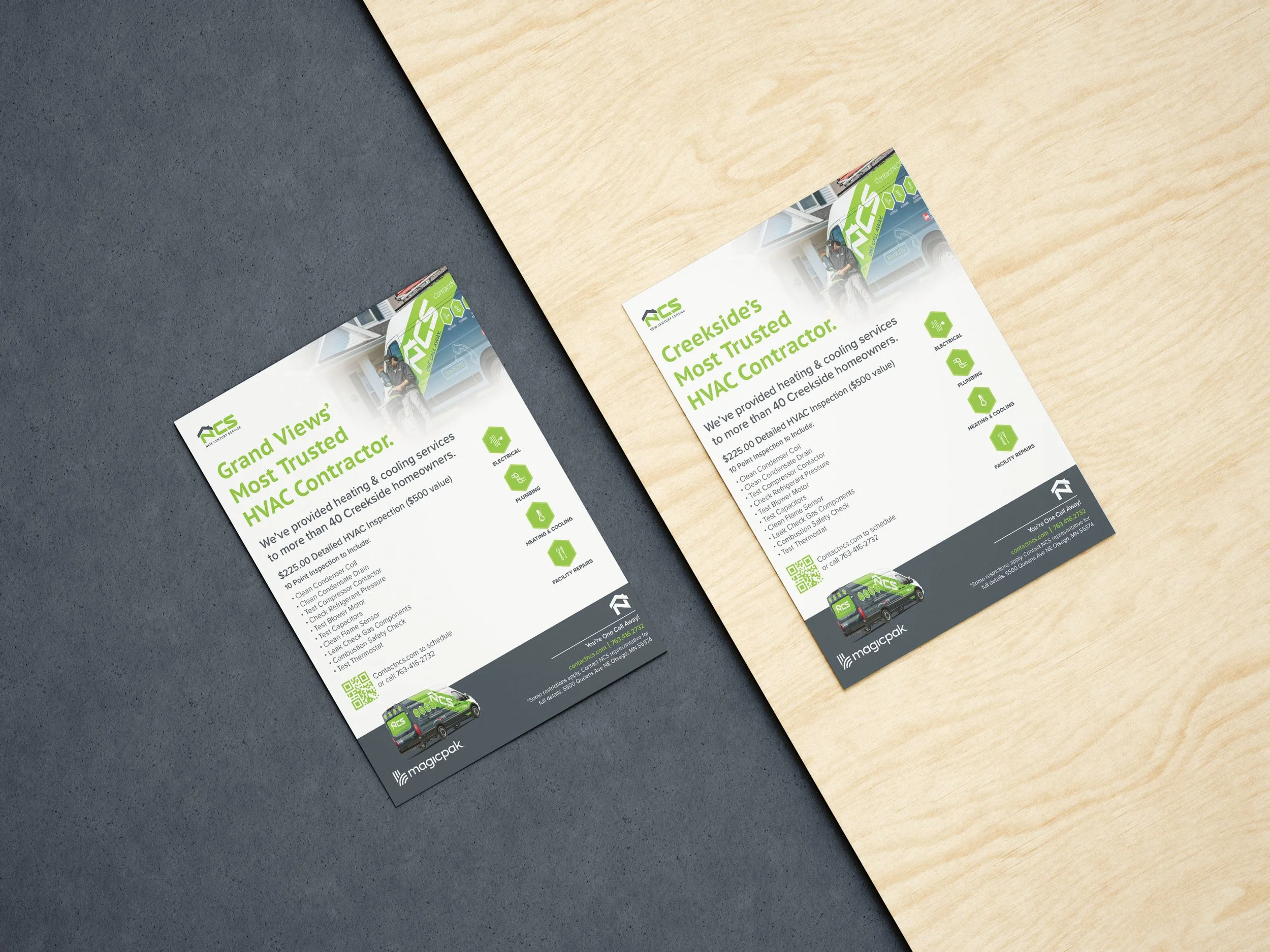 Flyers for a HVAC contracting business on a wooden table with a dark surface.