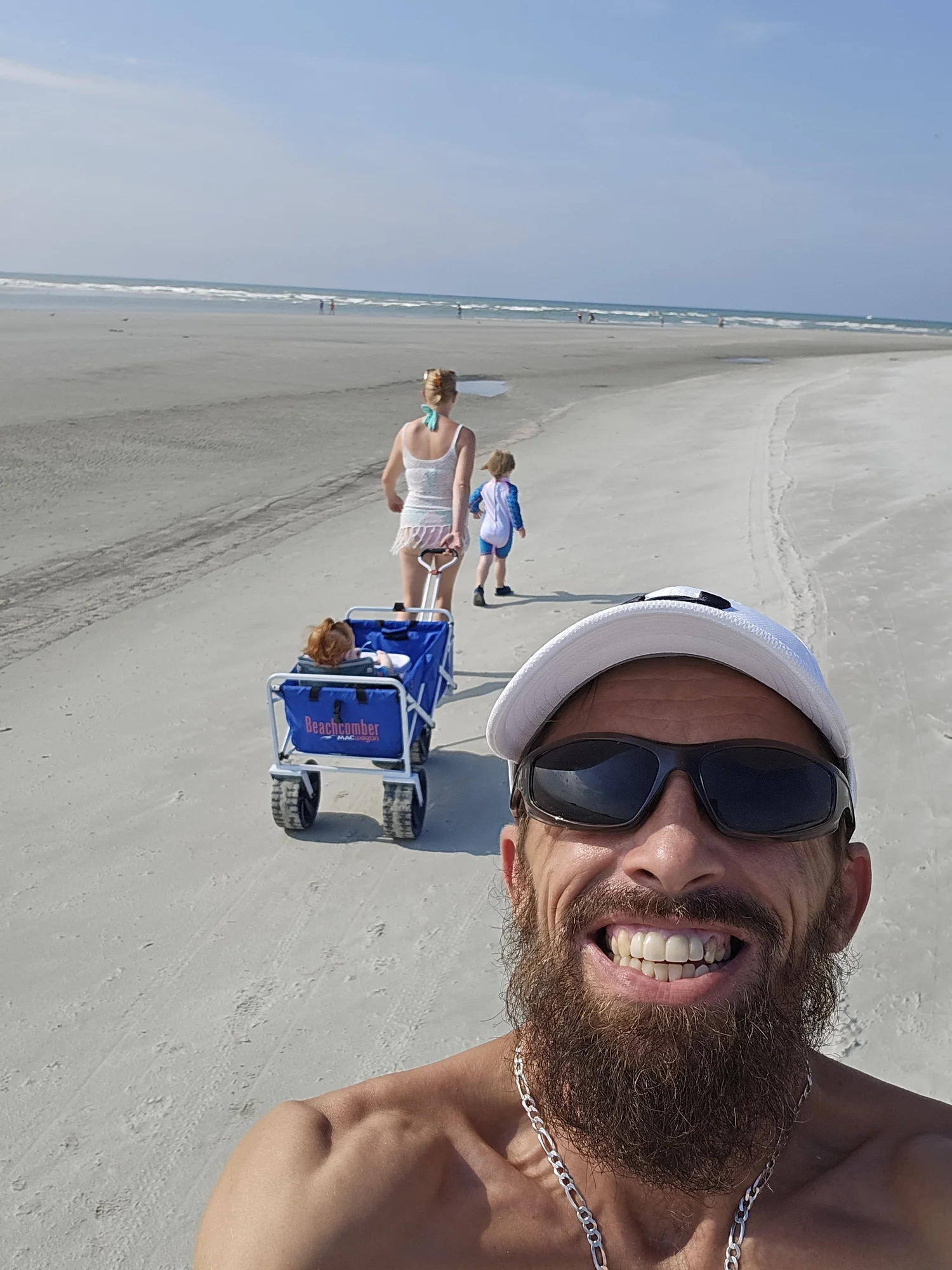 Paul Loftis enjoying a beach vacation with his family