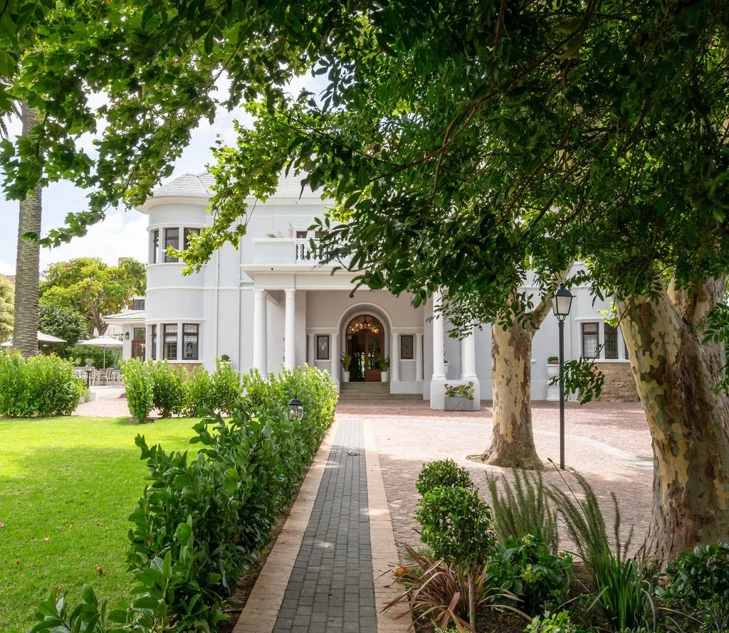 manor-house-entrance-pathway-trees.jpg