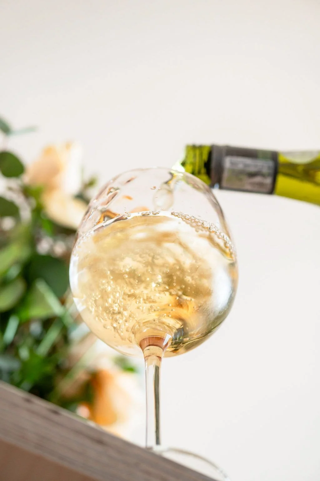 sparkling-wine-pour-glass-macro.jpeg