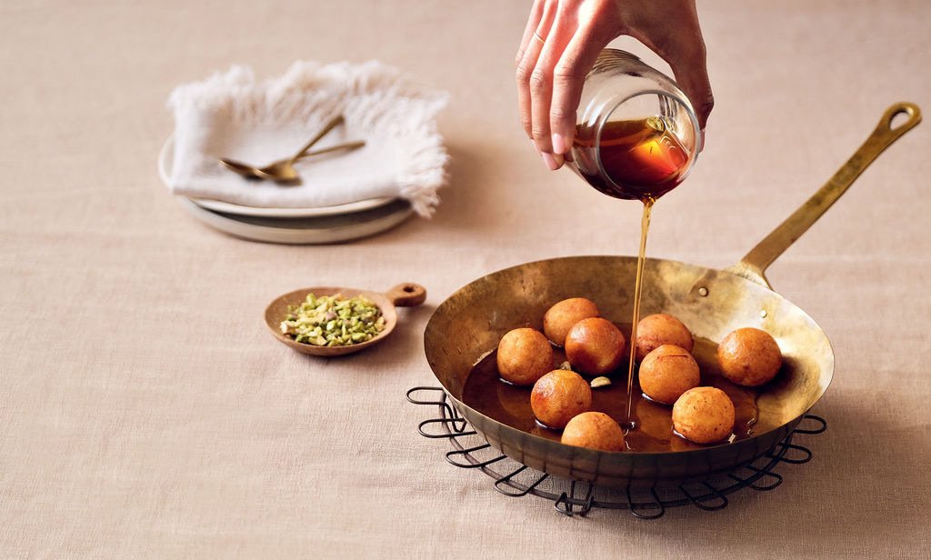 gulab-jamun-in-syrup-being-poured.jpg