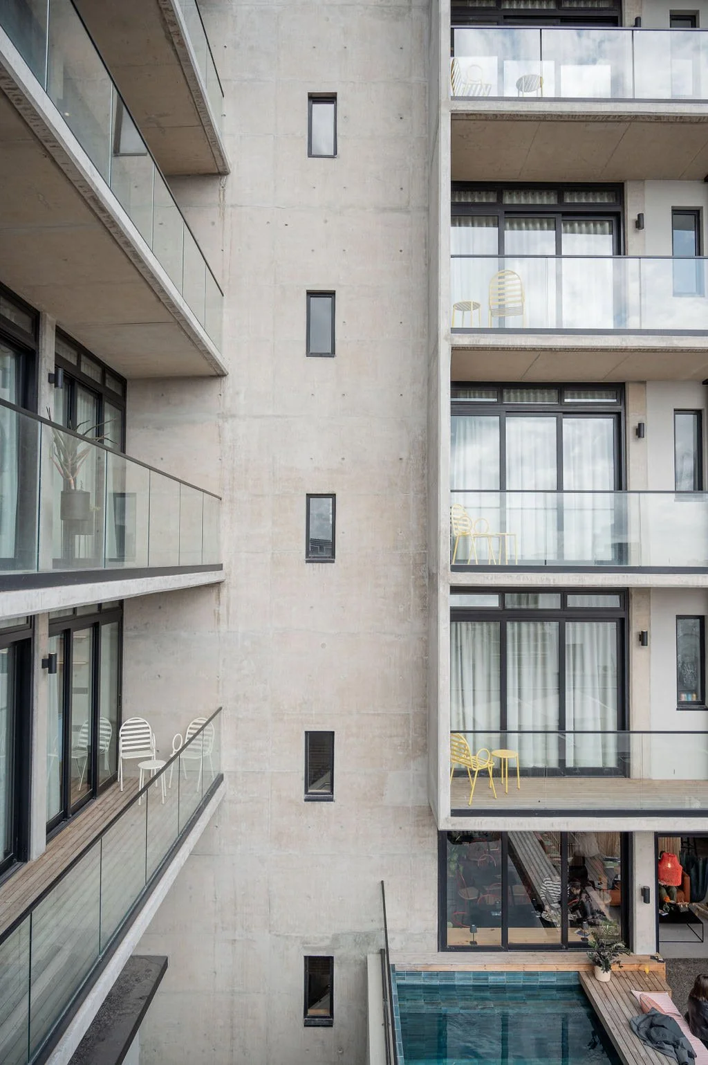 modern-hotel-facade-balconies-pool.jpg