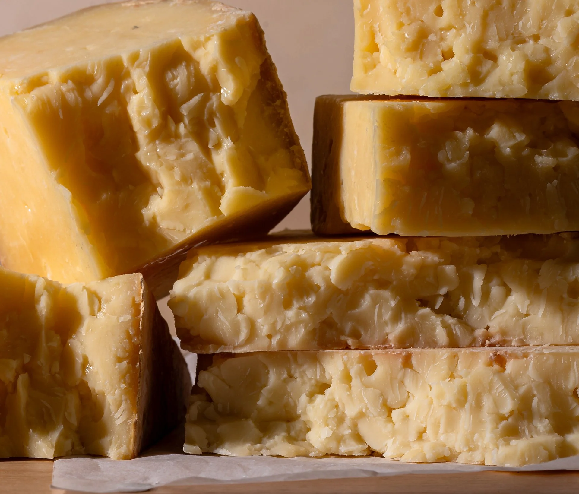 mature-cheddar-wedges-stacked.jpeg