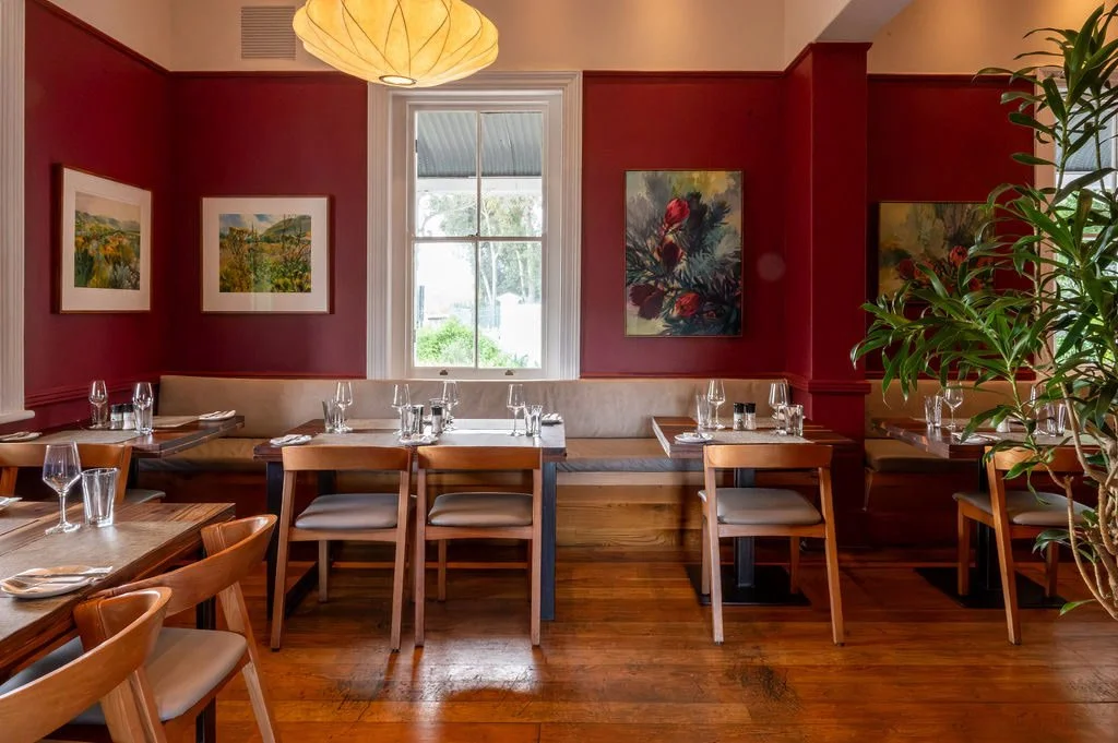 restaurant-dining-room-red-walls-artwork.jpg