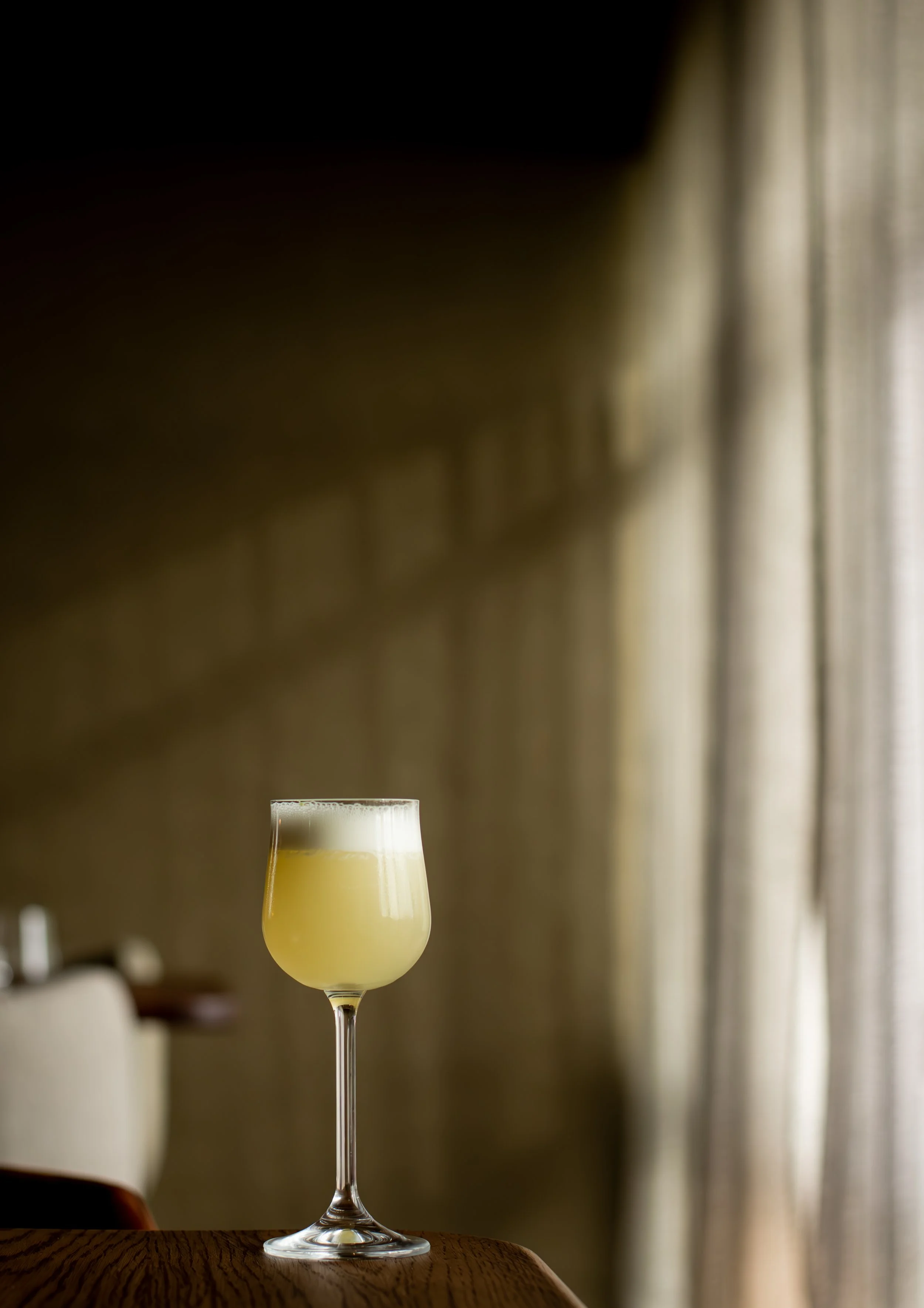 mertia-cocktail-backlit-window-moody.jpg
