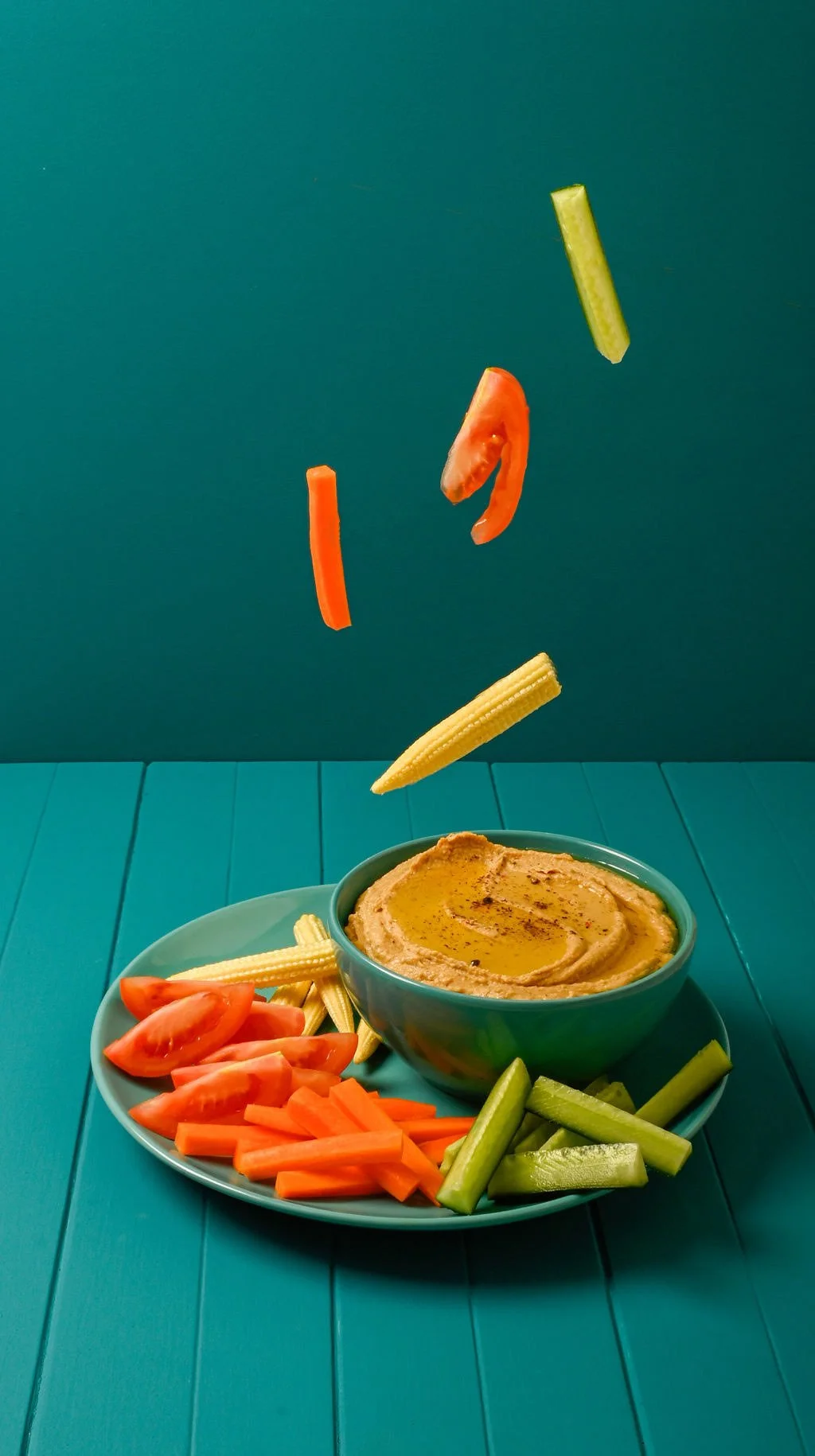 hummus-crudites-falling-vegetables-teal.jpg