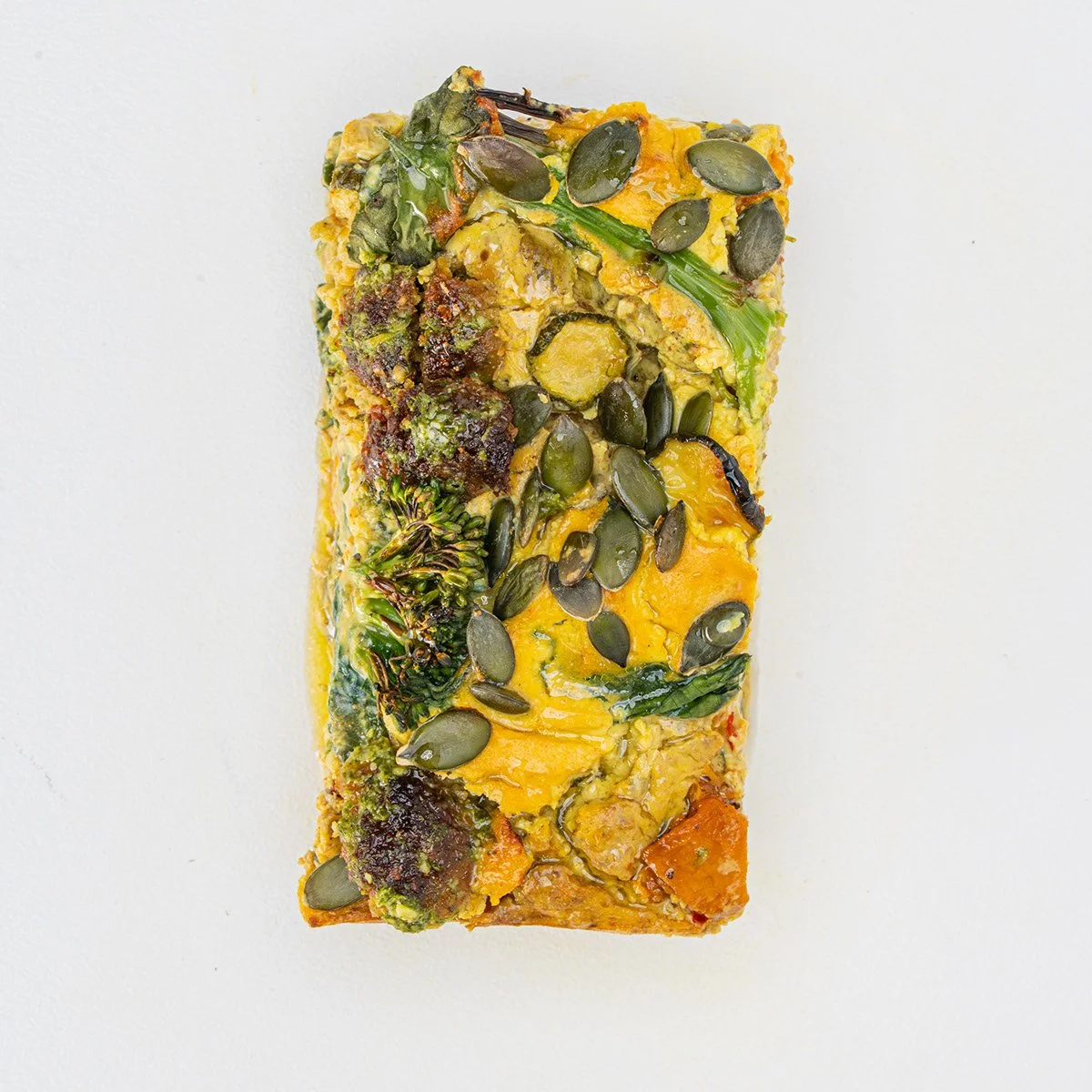 vegetable-frittata-pumpkin-seeds-slice.jpg