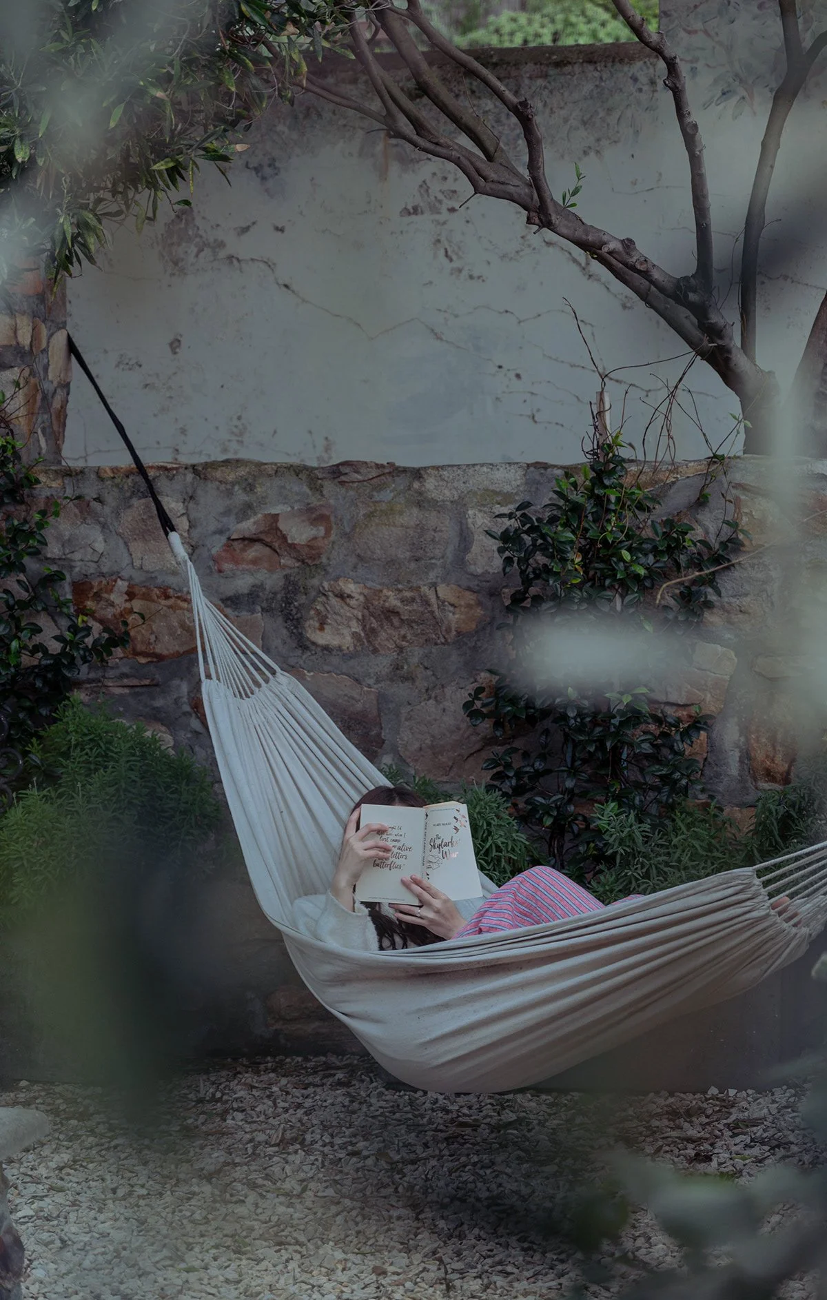 guest-reading-hammock-garden-courtyard.jpg