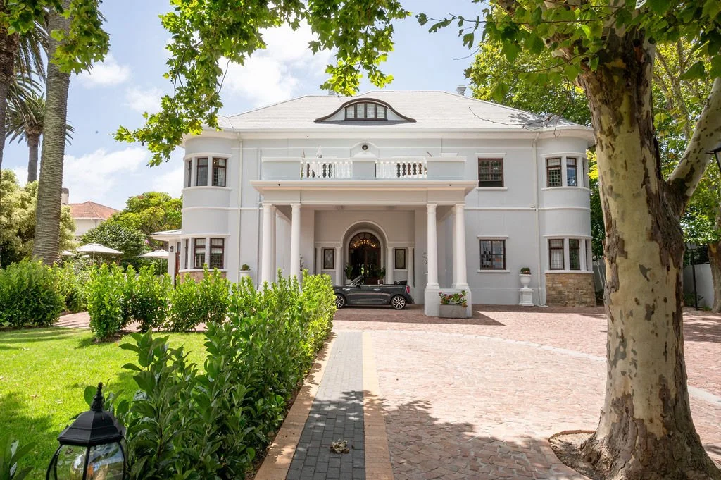 victorian-manor-house-exterior-sports-car.jpg