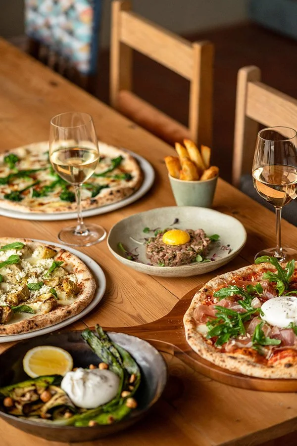 die-stoep-stellenbosch-table-spread-pizzas.jpg