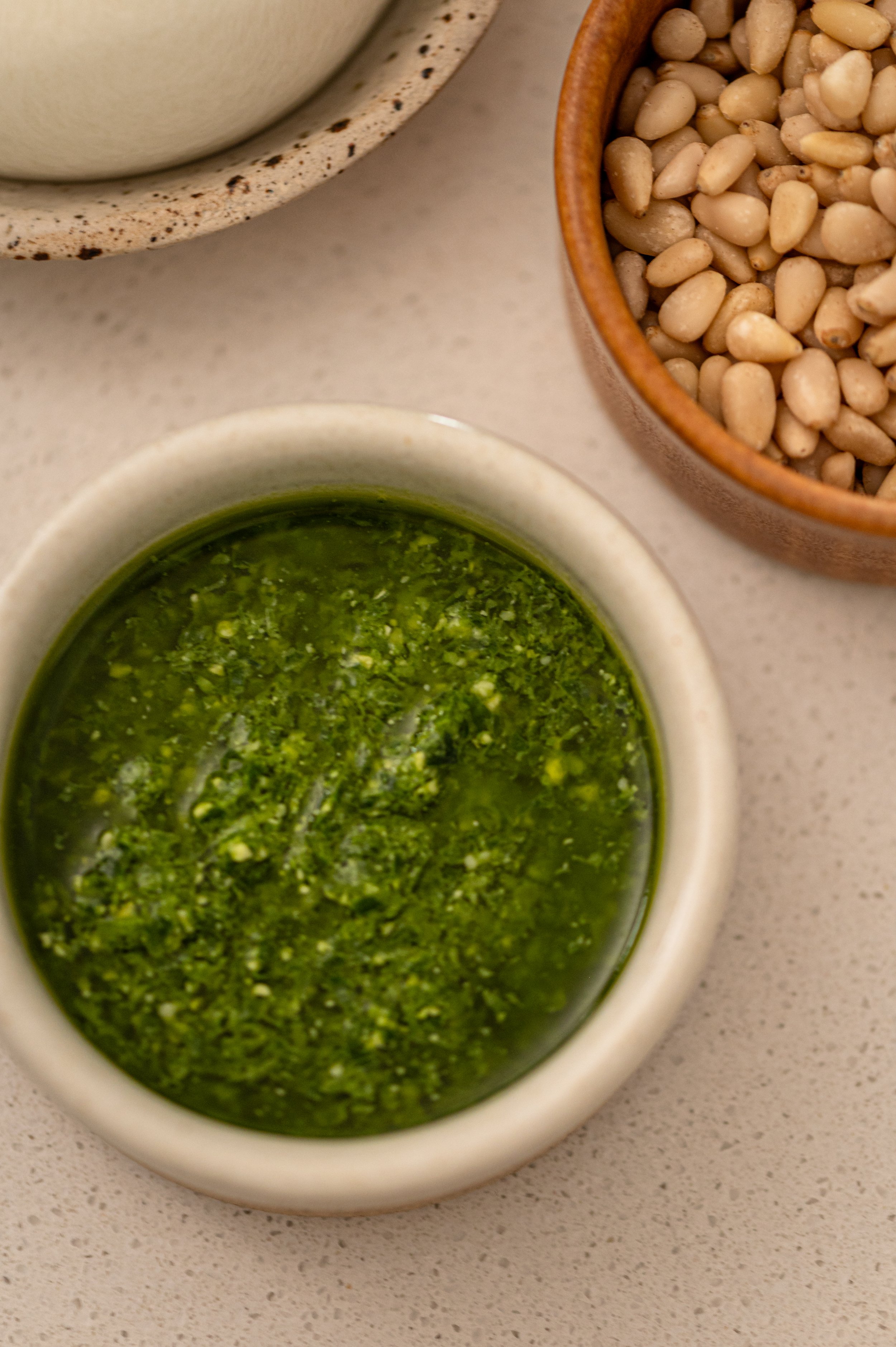 basil-pesto-pine-nuts-bowls-overhead.jpg