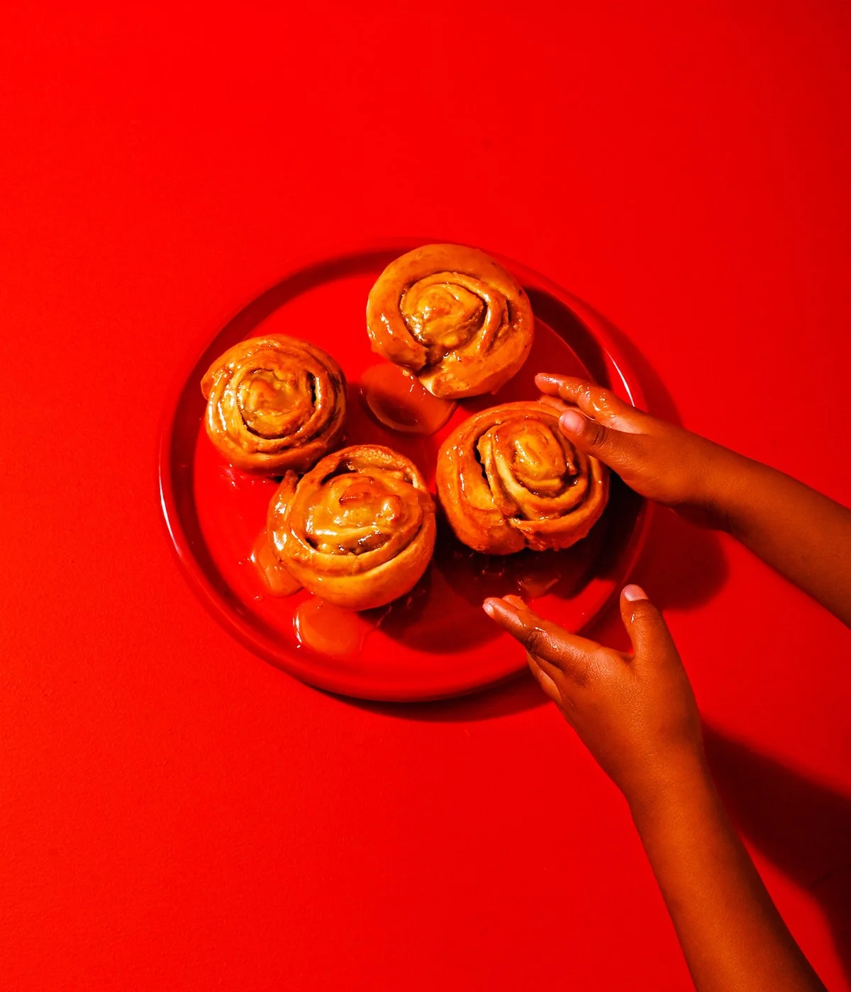 sticky-cinnamon-buns-red-plate.jpg