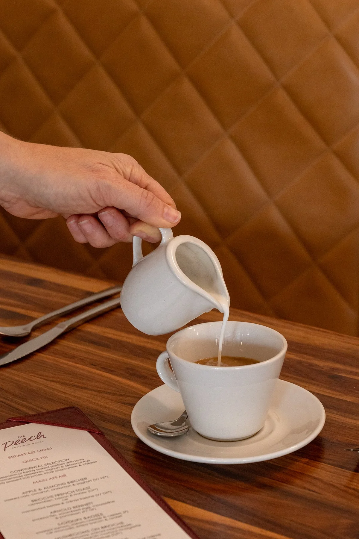 peech-hotel-breakfast-coffee-cream-pour.jpg