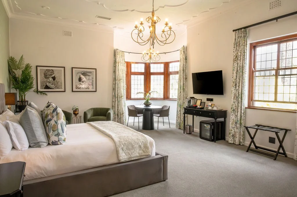 hotel-suite-bedroom-african-art-chandelier.jpg