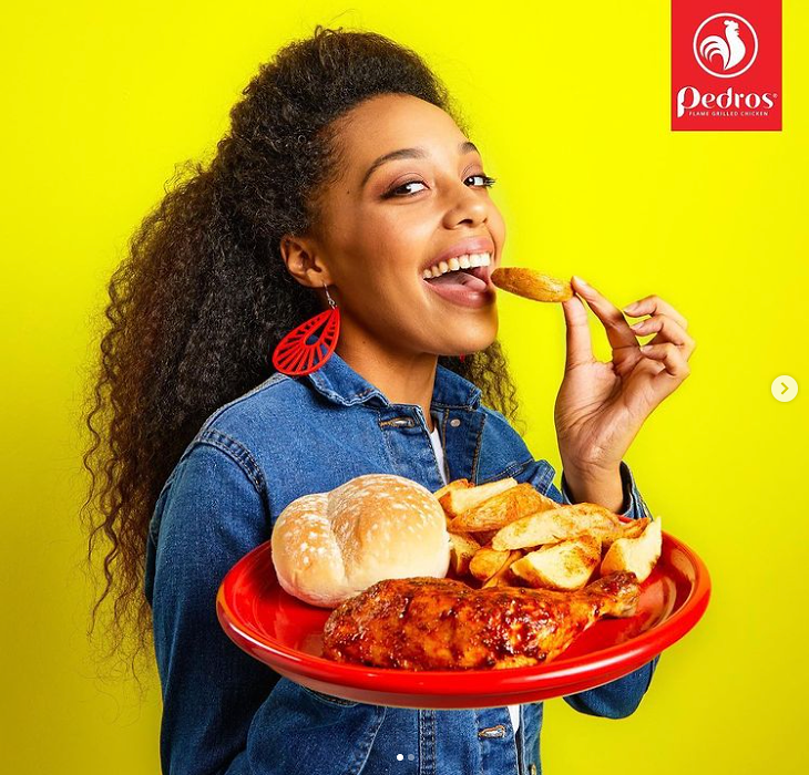 pedros-vivalicious-woman-eating-chicken-campaign.png