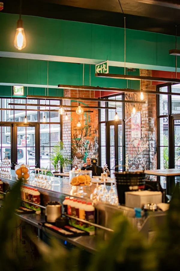 urban-cafe-interior-string-lights-graffiti-mural.jpg