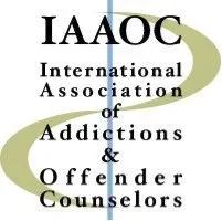 Logo of the International Association of Addictions & Offender Counselors (IAOAC) with stylized text and a green and blue swoosh design
